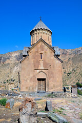 Church and beautiful natural landscape. Monastery in nature. Armenian Apostolic Church Noravank. Beautiful architecture of the church. Monastery against the backdrop of rocky mountains. Christianity i