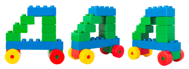 Isolated photo of construction block toy vehicle on white background.