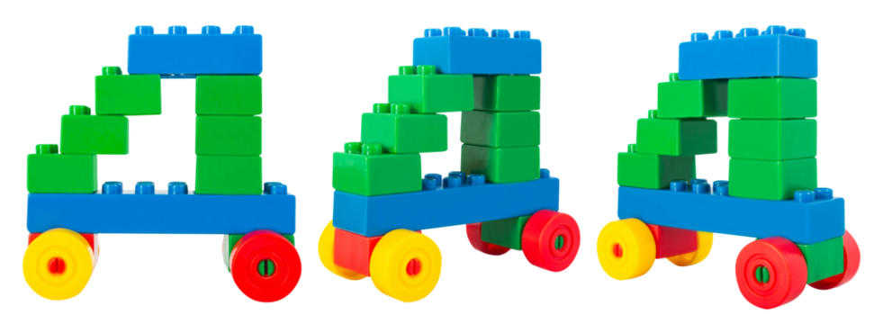 Isolated photo of construction block toy vehicle on white background.