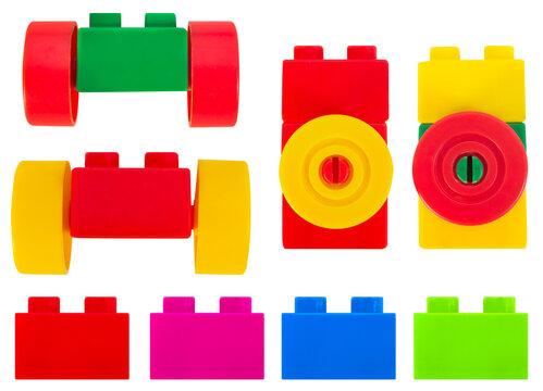 Isolated photo of construction block toy parts on white background.