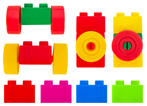 Isolated photo of construction block toy parts on white background.