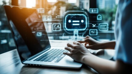 Person working on a laptop with digital interface