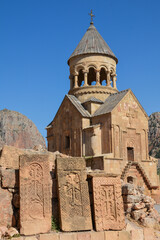 Church and beautiful natural landscape. Monastery in nature. Armenian Apostolic Church Noravank. Beautiful architecture of the church. Monastery against the backdrop of rocky mountains. Christianity i