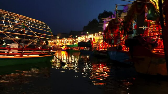 ram ghat in evening | chitrakoot dham | many boats are standing on the banks of the ram ghat | mandakini river | colourful boats on the river bank