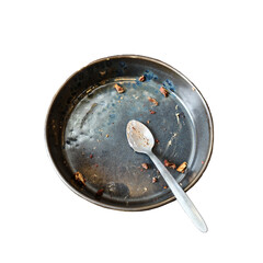 Empty Dish with remnants: The remnants of a delicious meal linger in an empty dish, a spoon resting amidst the subtle traces of a satisfying culinary experience.