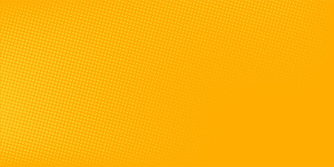 Yellow orange halftone background. Retro comic grain texture. Pixilated dots cartoon wallpaper. Pop art faded gradient pattern.