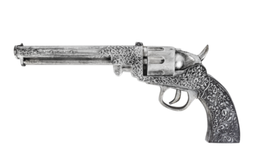 Isolated photo of cowboy toy revolver pistol on white background.