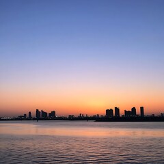 Sunset over the skyscrapers of the city.