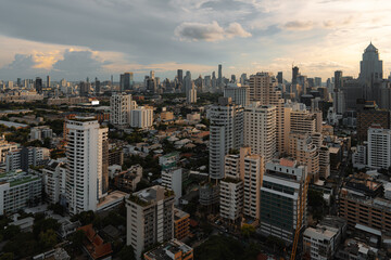 Fototapeta premium Skyline at Sunset with Urban High-Rise Buildings