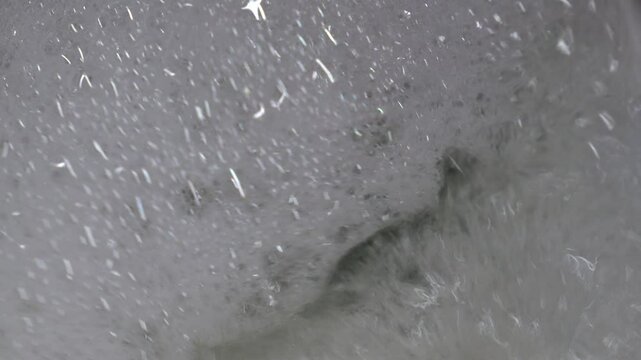 Toilet flush.
Foam from aroma diffuser in toilet.
Water and foam in toilet.
Close-up of toilet.
Man flushing toilet