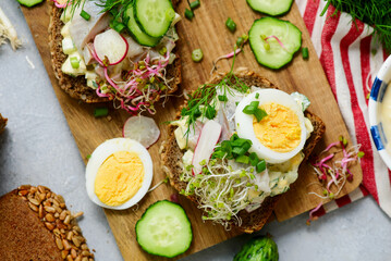 Danish Open-Faced Sandwich with herring on slices of rye bread.top veiw