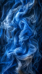 Blue wisps of smoke are flowing across a dark background in an ethereal movement, creating a sense of deep, swirling color and graceful abstraction.