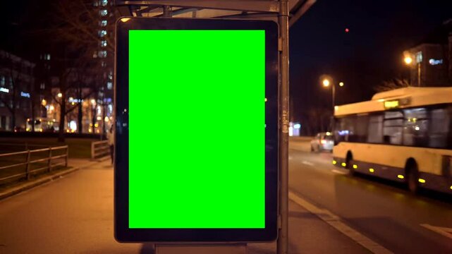 Urban Billboard with Green Screen at Night for Advertisement Mockup