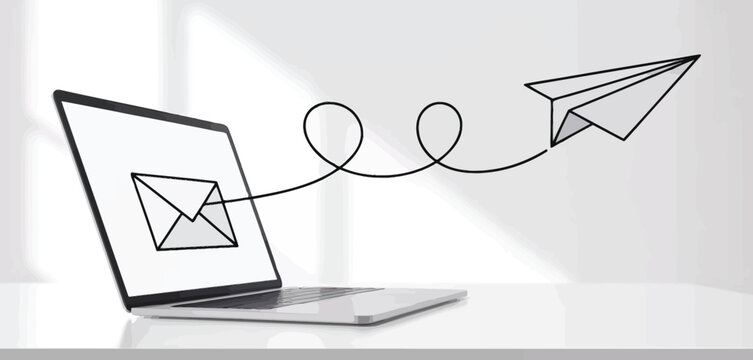 Email sending concept laptop paper airplane