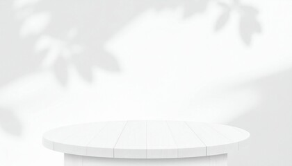 Round white wood table top with abstract shadow drop on white wall background for mockup product display
