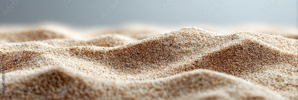 Aufkleber Detailed macro shot of sand texture on beach showing fine grains and natural patterns with soft lighting creating calm and peaceful mood