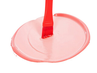Red brush applying pink paint isolated on transparent background