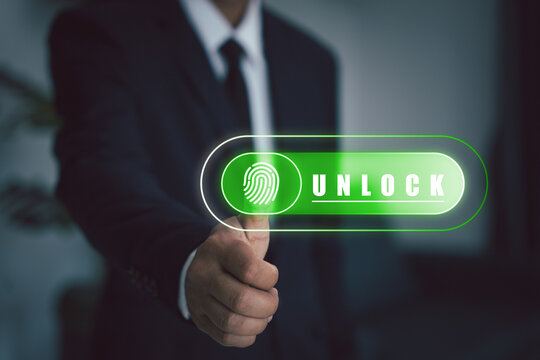 Businessman used  finger scan to unlock secure access, featuring a prominent finger lock icon and unlock wording. cyber security interface. Showcases modern technology for access authentication