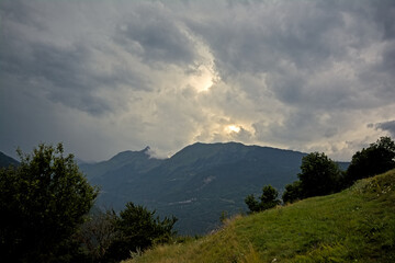 Mountain peaks under a dark stormy sky n La Vanoise national park, Savoie, France 