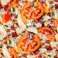 Seamless 4k photo texture material of pizza with sausages and tomatoes.