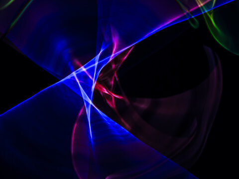 colorful light trails in dark background. Abstract light routes that rotate in vibrant colors. Forestry of the blurry movement of light painting. Blurred lights at night. Intentional camera movement, 