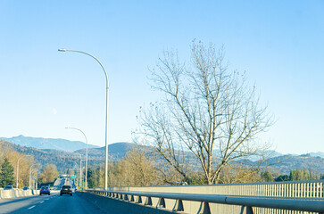 View of Fraser Valley countryside around Chilliwack, BC, Canada. Snow covere d peaks of Mt. Baker...