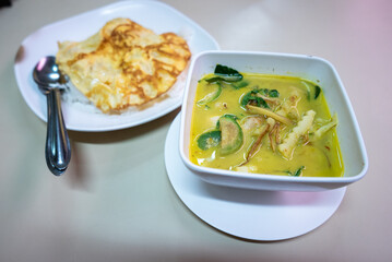 Delicious chicken curry and roti local restaurant food cozy eatery close-up culinary delight