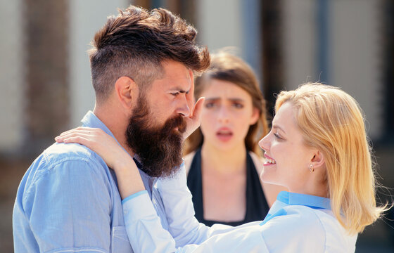 Cheating. Emotional treason. Cheating couple. Man lied, cheated, and betrayed. Treason of the heart. Emotional treason. Feel cheating. Man cheating his wife or girlfriend. Love triangle and threesome.