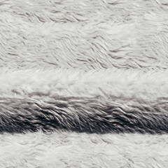 Seamless 4k photo texture of white folded fur material.