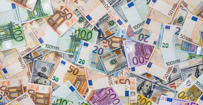 Two leading currencies - dollar and euro bills for desing