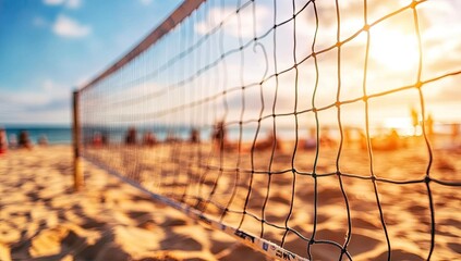 Beach volleyball net at sunset