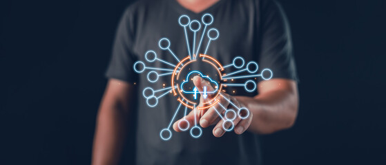 person interacts with a glowing cloud network interface symbolizing digital connectivity, cloud...
