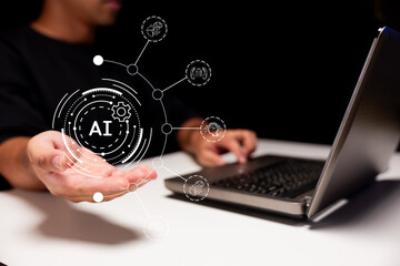 A person working on a laptop presenting a digital AI interface with futuristic icons, symbolizing artificial intelligence and technology integration.