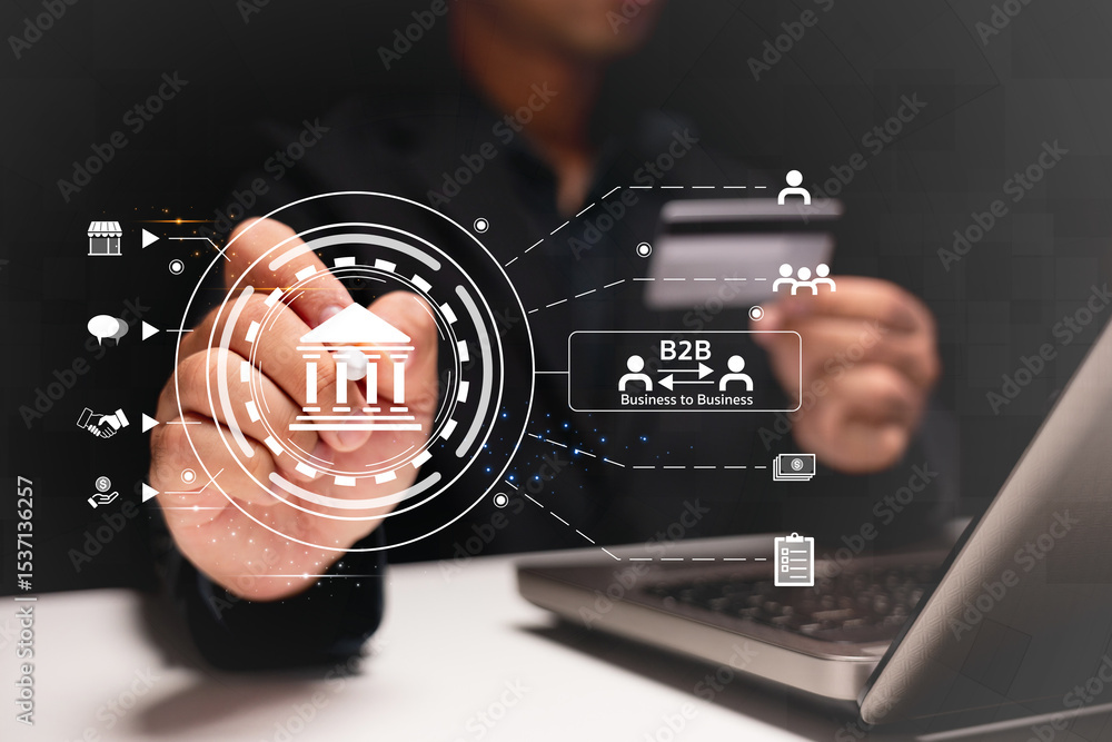 Poster a person interacting with digital business and banking icons on a transparent interface above a lapt