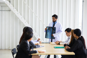 Hospital Medical Research : Group of Doctor, nurse and healthcare professional team meeting sitting in the boardroom,  Planning and brainstorming health