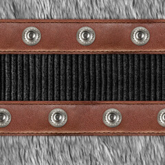Seamless 4k photo material texture of light gray fur with leather straps and buttons.