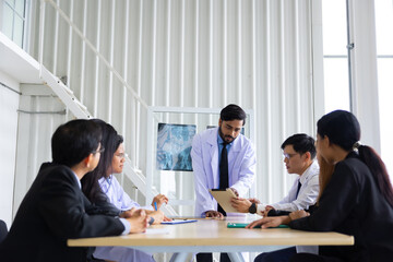 Hospital Medical Research : Group of Doctor, nurse and healthcare professional team meeting sitting in the boardroom,  Planning and brainstorming health