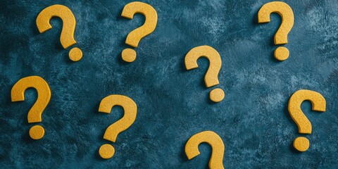 Scattered Question Marks on a Textured Surface