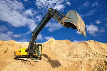 Yellow Excavator at Construction Site