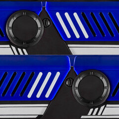 Seamless 4k photo texture material of blue plastic tech panel surface with white striped decals.