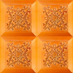 Seamless 4k photo texture material of brown colored ornate baroque panel tile surface.
