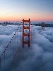 the golden gate bridge in san francisco, covered by clouds during sunset © Johannes