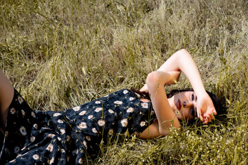 Brunette female 19 years old posing outdoor as fashion model