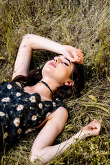 Brunette female 19 years old posing outdoor as fashion model