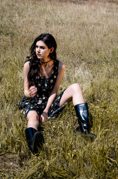 Brunette female 19 years old posing outdoor as fashion model