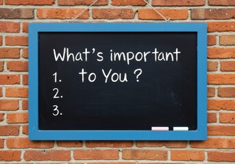 Fototapeta premium Whats important to you question on blackboard