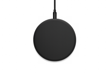 Floating black wireless charging pad suspended against transparent backdrop, showcasing sleek minimalist technology design