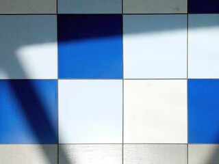 Colored Tiles Creating Patterns on the Floor With Fascinating Shadows in Natural Light