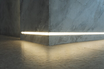 In a cozy and inviting corner of a room, a soft and warm light gently rests on the floor, casting...