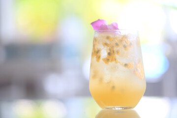 passion fruit lemonade background, cold lemonade in a glass, delicate texture cold tropical drink...